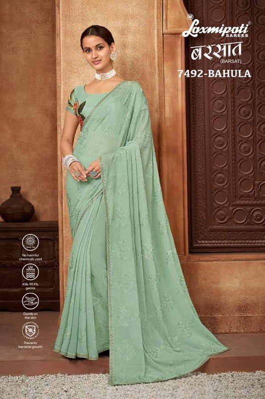 Laxmipati Georgette Pista Green Saree (6198) in Nanded at best price by Me  Sarang Cloth Center - Justdial