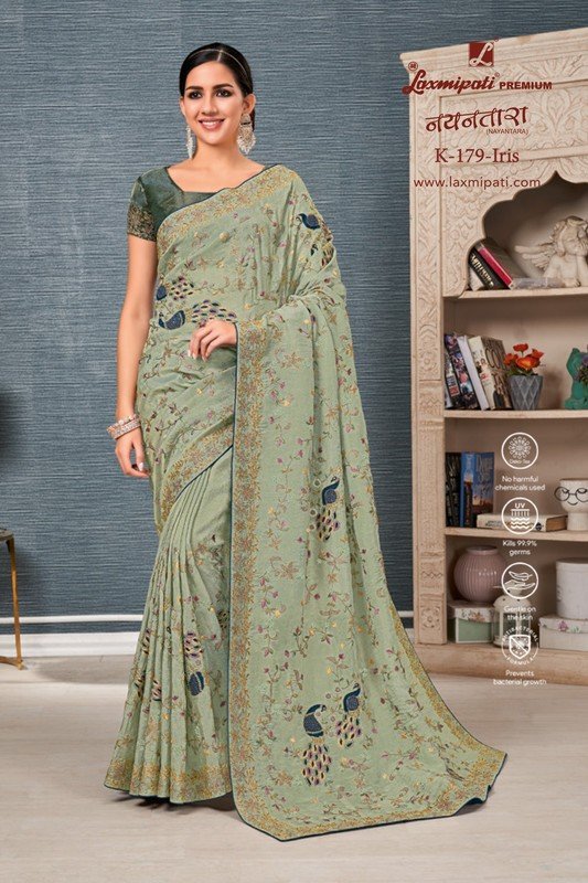 Laxmipati Nayantara K-179 Pista Green Tissue Silk Saree